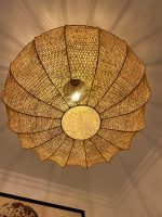 Handmade wavy raffia pendant light with ribbed pumpkin shape
