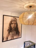 Handmade wavy raffia pendant light with ribbed pumpkin shape