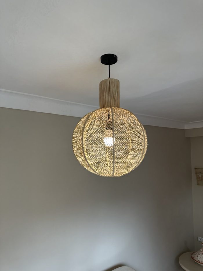 Round raffia pendant light handmade in Morocco with woven globe shape