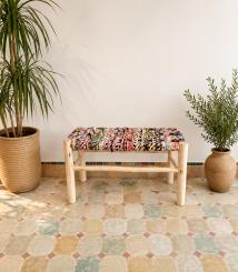Boucherouite Bench handcrafted from solid wood with a colorful handwoven Moroccan seat