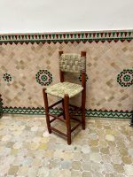Handwoven Palm Leaf Bar Stool handcrafted from solid wood with a natural woven palm leaf seat