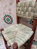 Handwoven Palm Leaf Bar Stool handcrafted from solid wood with a natural woven palm leaf seat