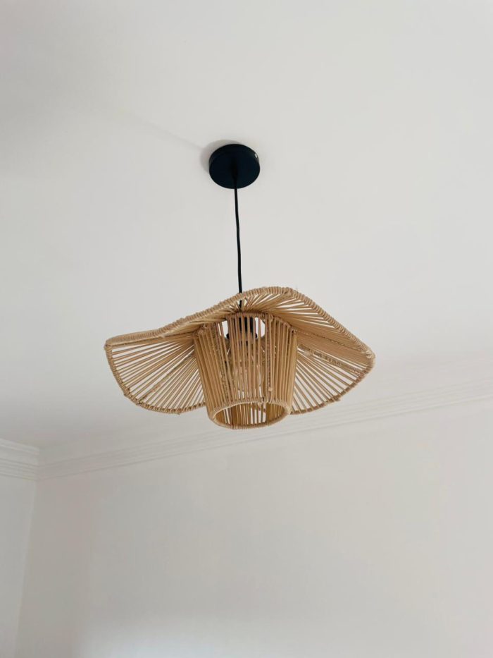 Sculptural raffia pendant light with open radial flared shade