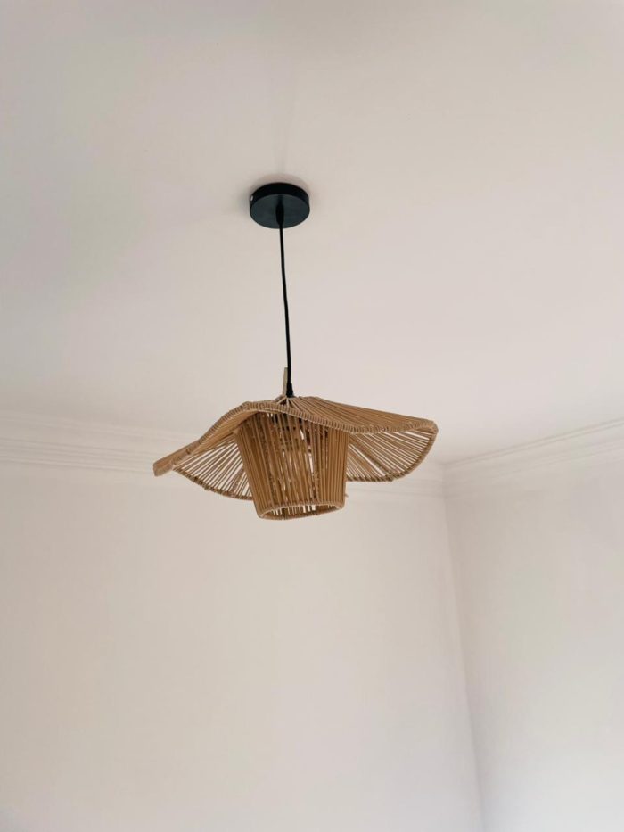 Sculptural raffia pendant light with open radial flared shade