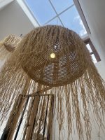 Moroccan straw ball pendant light with long natural raffia fringe