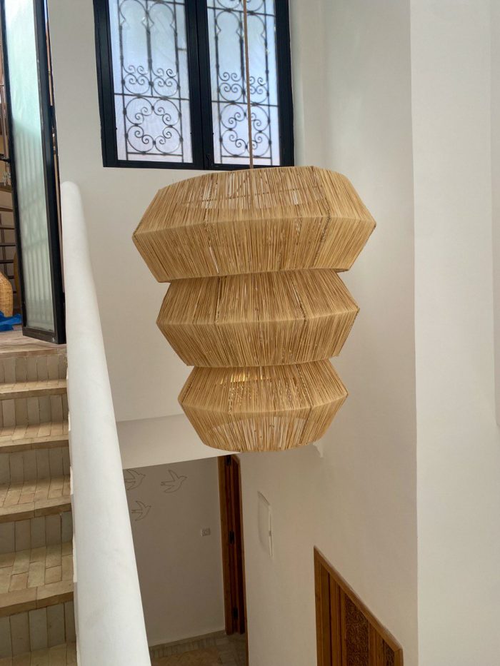 Tiered raffia pendant light with three geometric handwoven sections