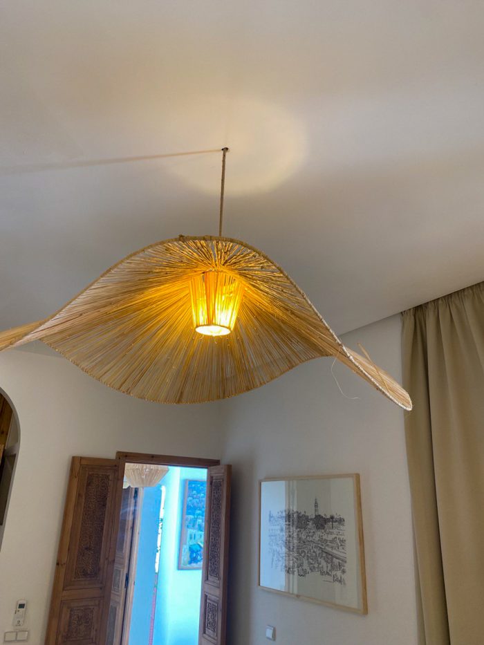 Wave raffia pendant light handmade in Morocco with sculptural woven shade