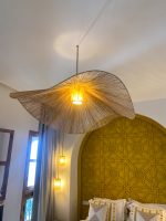 Wave raffia pendant light handmade in Morocco with sculptural woven shade