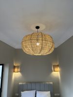 Moroccan raffia pendant light with handmade wavy woven shade