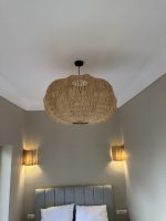 Moroccan raffia pendant light with handmade wavy woven shade