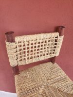 Palm Leaf Counter Stool handcrafted from solid wood with a natural handwoven palm leaf seat