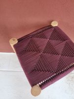 Burgundy Cord Stool handcrafted from solid wood with a handwoven burgundy cord seat