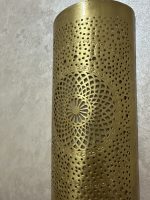 Handmade radiant rosette brass wall sconce with central geometric floral medallion and pierced decorative pattern.