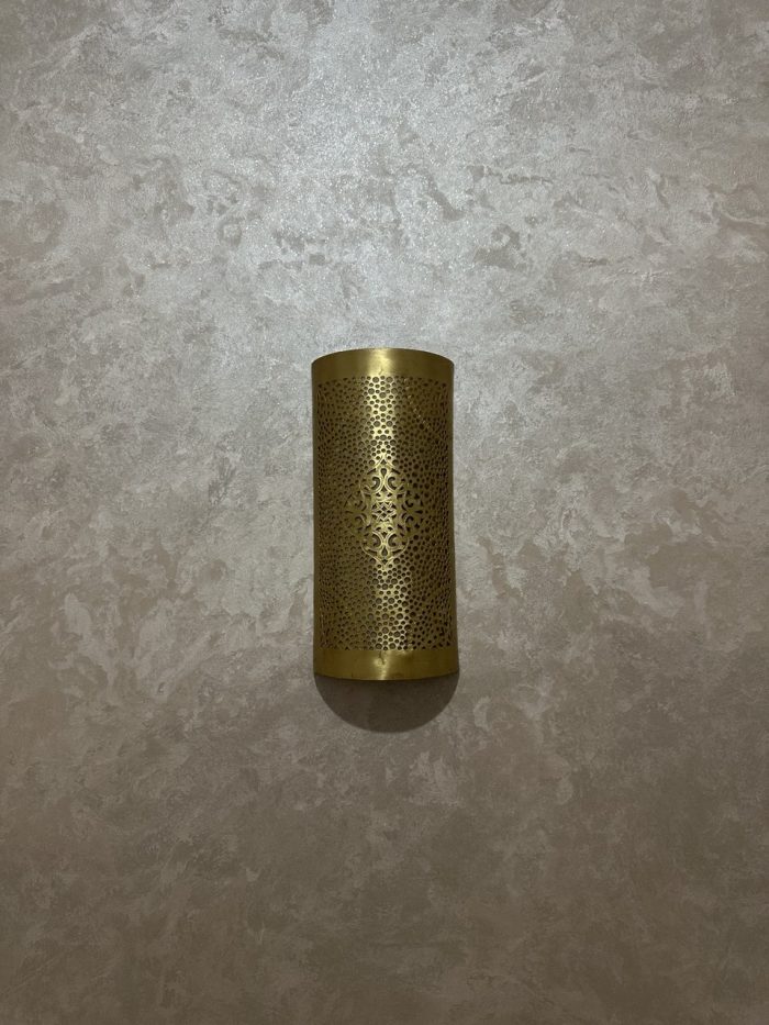 Handmade diamond medallion brass wall sconce with intricate perforated pattern and warm decorative up-and-down lighting.