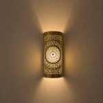 Handmade radiant rosette brass wall sconce with central geometric floral medallion and pierced decorative pattern.