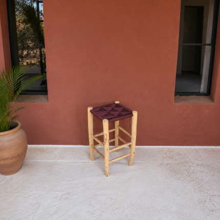 Burgundy Cord Stool handcrafted from solid wood with a handwoven burgundy cord seat