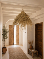 Natural Doum Straw Fringe Pendant Light handmade from woven straw and doum fibers with long flowing fringe.
