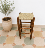 Palm Leaf Rope Bar Stool handcrafted from solid wood with a natural handwoven palm leaf rope seat