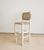 Handcrafted Palm Leaf Bar Stool made from solid wood with a natural handwoven palm leaf seat