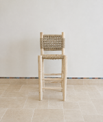 Handcrafted Palm Leaf Bar Stool made from solid wood with a natural handwoven palm leaf seat