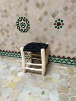 Small Black Rope Stool handcrafted from solid wood with a handwoven black rope seat