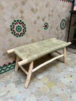 Handwoven Palm Leaf Bench handcrafted from solid eucalyptus wood with a natural woven palm leaf seat