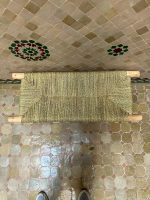 Handwoven Palm Leaf Bench handcrafted from solid eucalyptus wood with a natural woven palm leaf seat