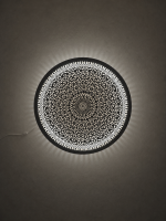 Ornate Brass Medallion Wall Light handcrafted from solid brass with intricate pierced floral detailing