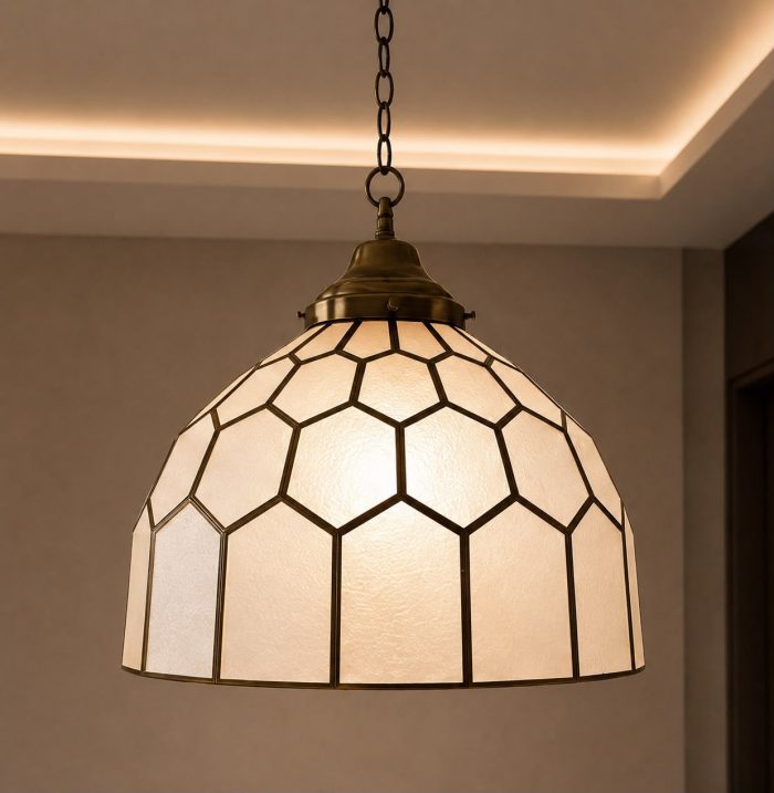 Stained glass pendant light with geometric dome shade