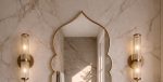 Moroccan Arch Brass Mirror with pointed Moorish shape above bathroom vanity