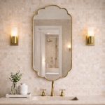 Handmade Moroccan Scalloped Brass Mirror with decorative floral shape above bathroom vanity