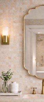 Handmade Moroccan Scalloped Brass Mirror with decorative floral shape above bathroom vanity