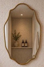 Scalloped Brass Mirror with handmade Moroccan brass frame above bathroom vanity