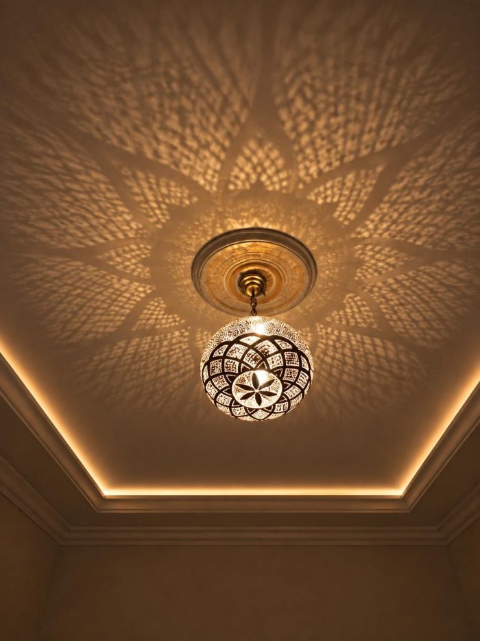 Globe Moroccan Brass Pendant Light casting decorative patterned shadows across ceiling