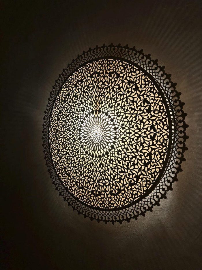 Round Filigree Brass Wall Light with intricate hand-perforated brass design
