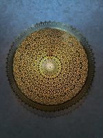 Round Filigree Brass Wall Light with intricate hand-perforated brass design