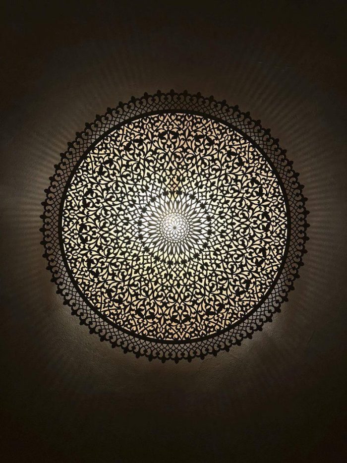 Round Filigree Brass Wall Light with intricate hand-perforated brass design