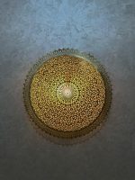 Round Filigree Brass Wall Light with intricate hand-perforated brass design