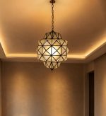 Geometric Glass Pendant Light with faceted glass panels and handcrafted metal frame